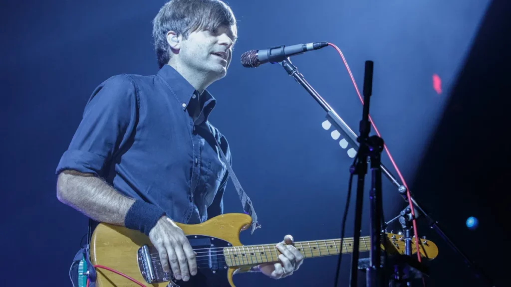 Watch Chris Martin's Surprise Performance At A Quaint