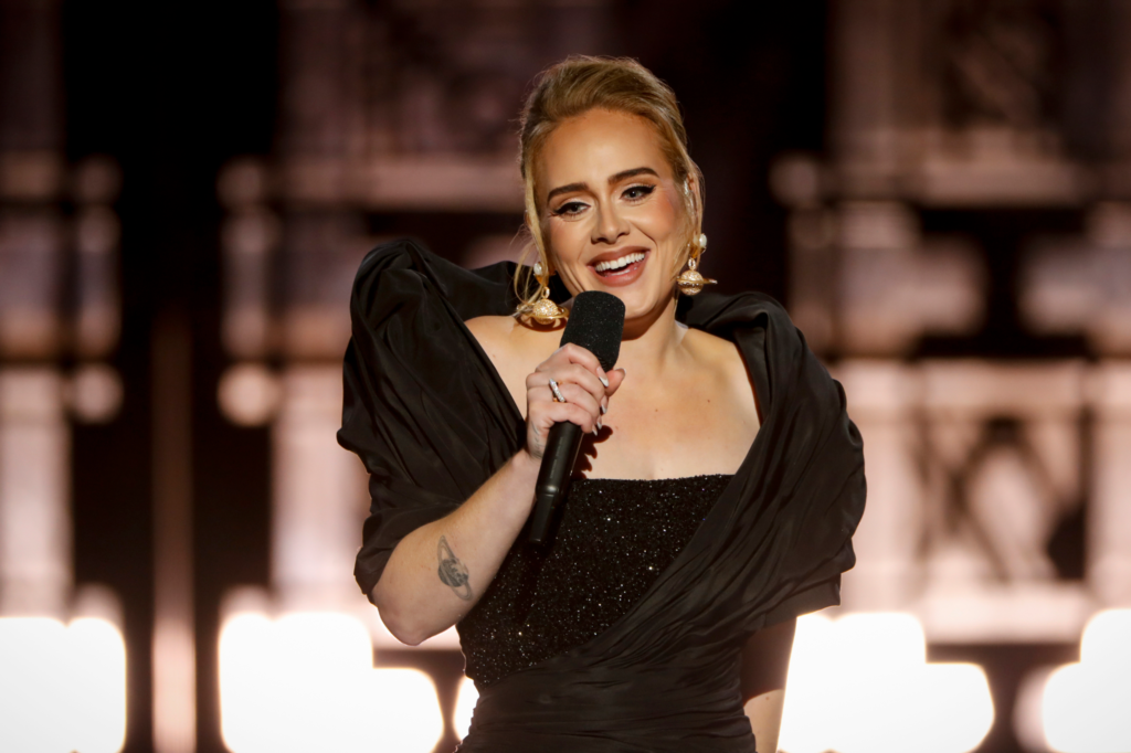 Adele Glows In Black Sparkly Gown For 2nd London Show Where She Fired Cash & T-Shirts At Fans