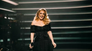 Adele Glows In Black Sparkly Gown For 2nd London Show Where She Fired Cash & T-Shirts At Fans